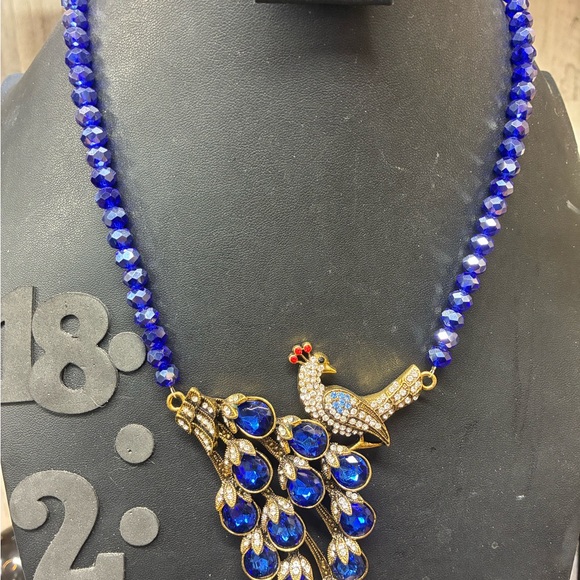 Elegant Blue and Gold Peacock Necklace